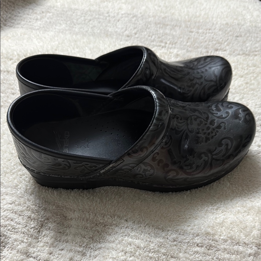 Dansko Black Patterned Clogs - Picture 2 of 6